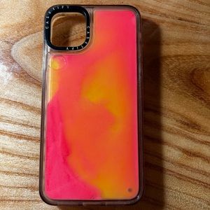 A casetify case that has orange and pink sand.